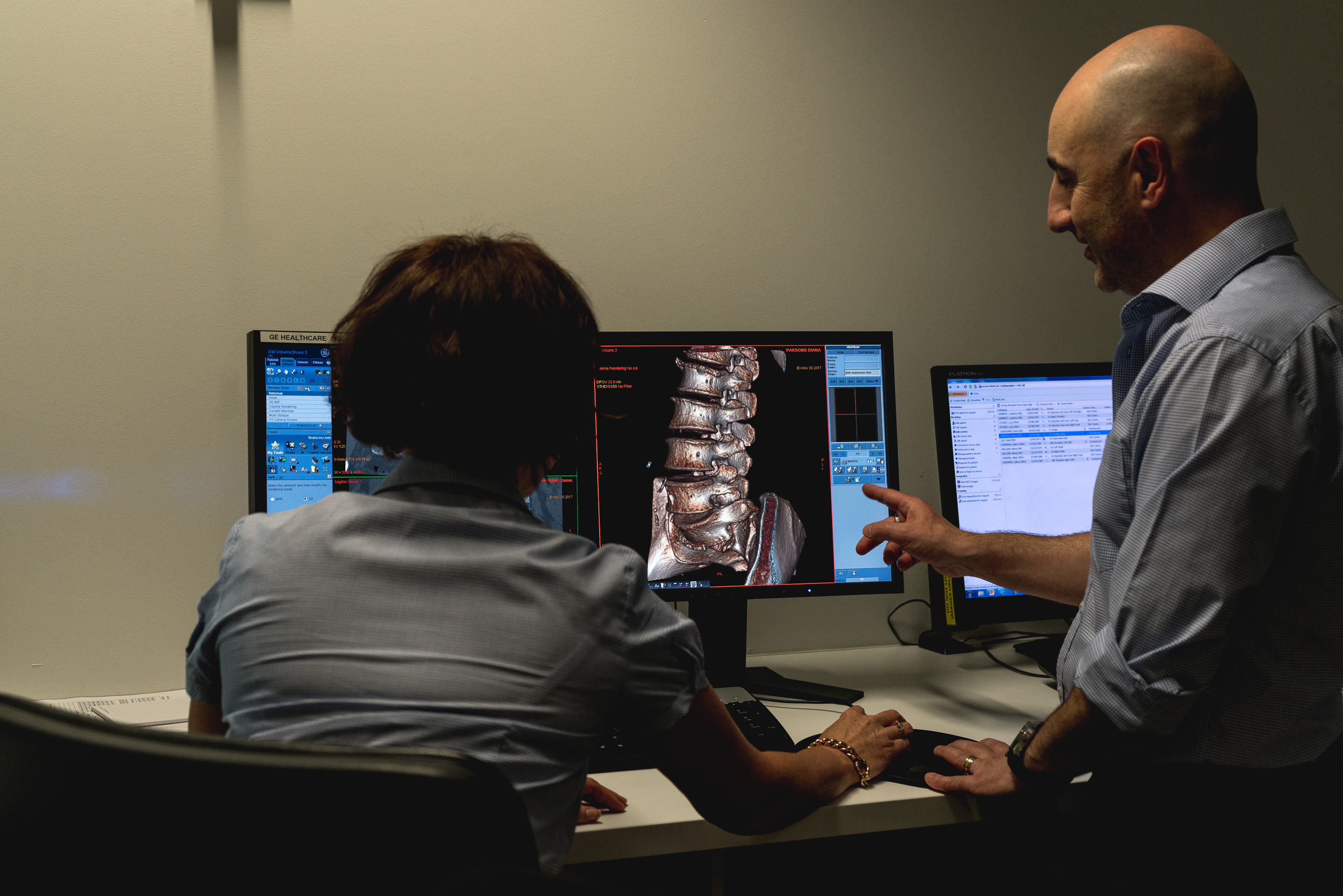 Two Doctors Analysing Patient Xray | Interventional Radiology Near Me | Fowler Simmons Radiology