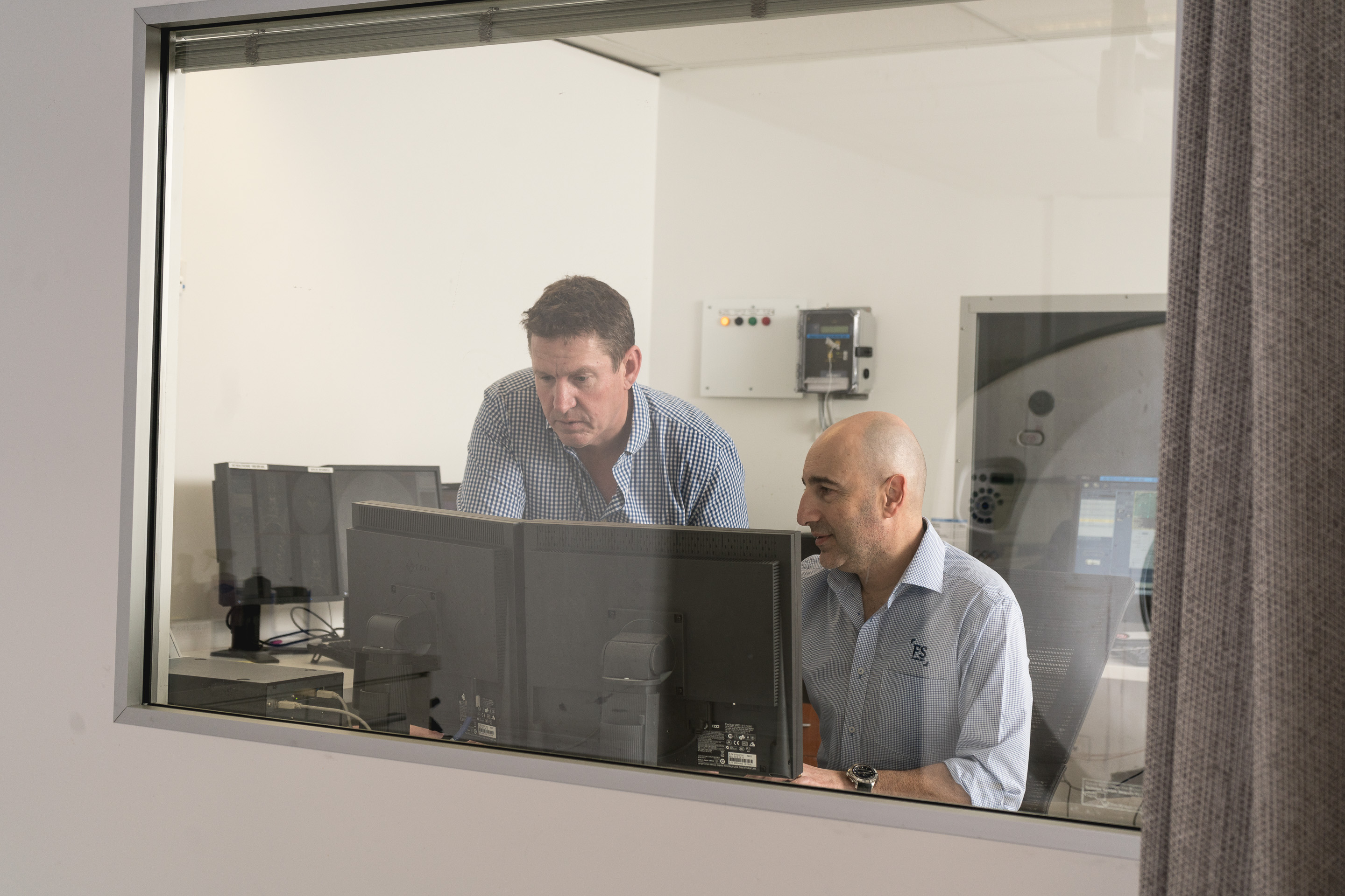 Two Doctors Discussing About Medical Xray Results | Radiology Centre | Fowler Simmons Radiology