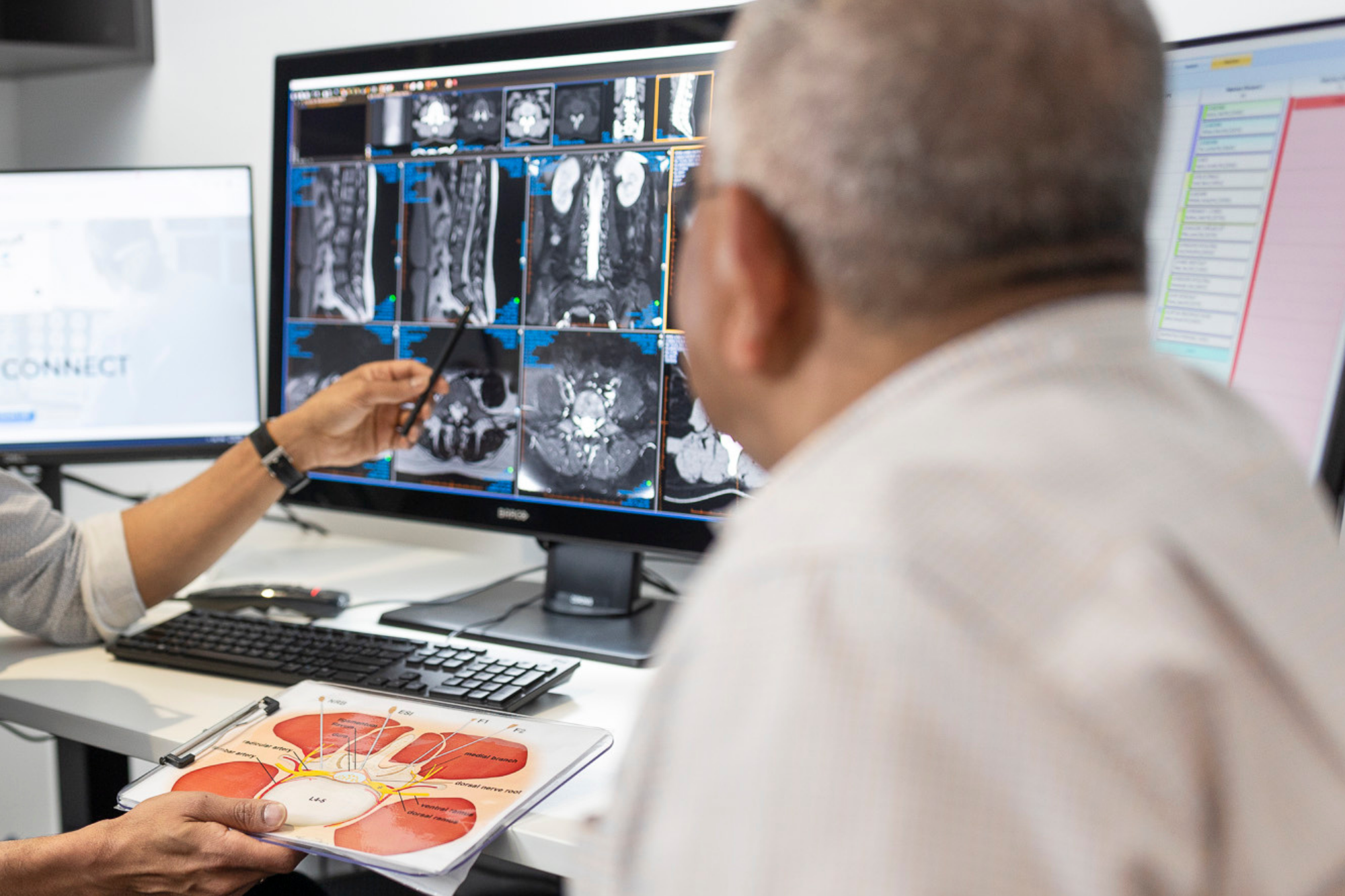 Doctor Explaining Xray Results to Patient | Ultrasound Services Near Me | Fowler Simmons Radiology